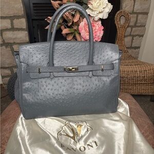 Pavoni custom made genuine leather handbag